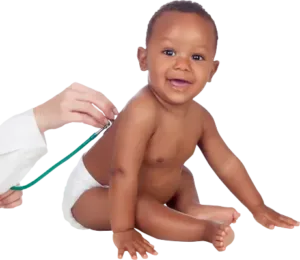 Smiling baby getting a checkup.